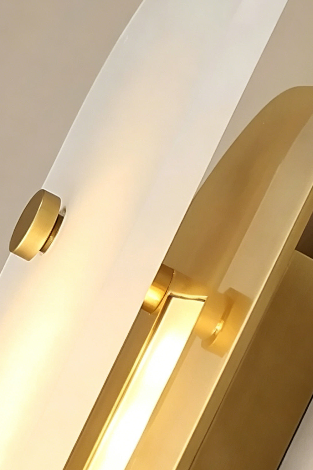 Edge profile of alabaster lamp | Alabaster, Metal | Stone against large brass panel detail | vexa lamps