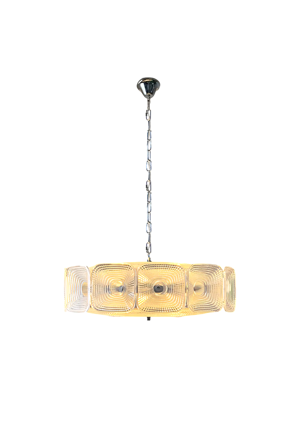 Lyra Geometric Glass Chandelier | Glass, Metal | Fully lit modern circular ring chandelier featuring textured square glass panels with concentric geometric groove patterns on a silver chrome frame | Isolated product shot on white background | vexa lamps