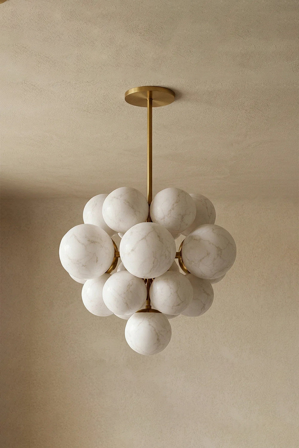 Marcella Alabaster Grape Cluster Chandelier showcasing hand-carved alabaster spheres with a brushed gold downrod.