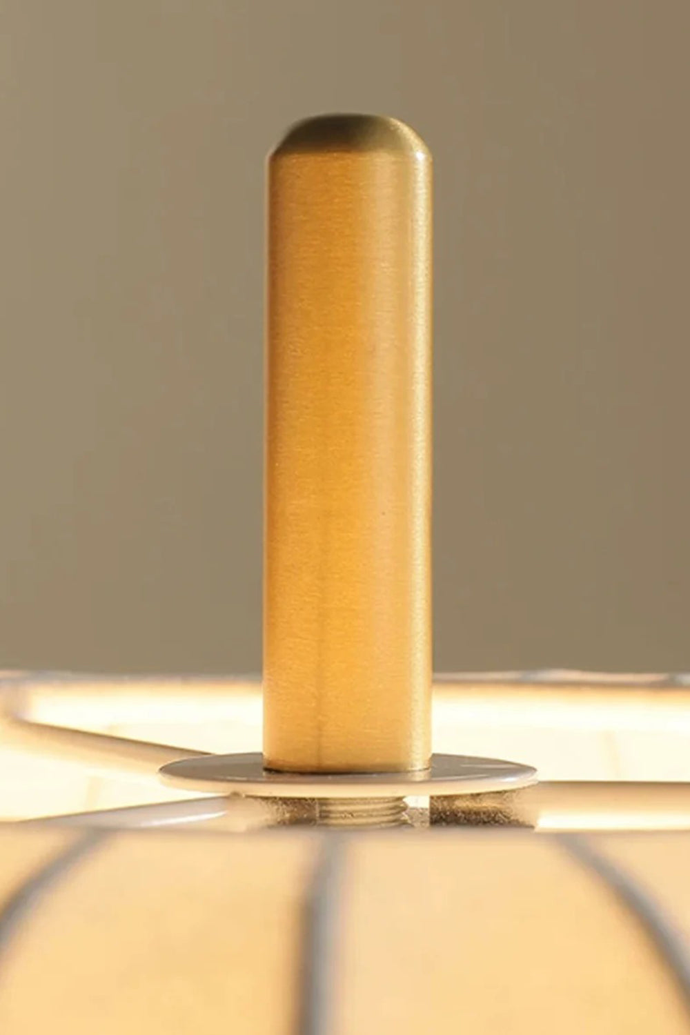 Maren Woven Silk Gourd Table Lamp | Woven Silk, Brass and Wood | Close-up view of the top cylindrical brass finial detail | vexa lamps