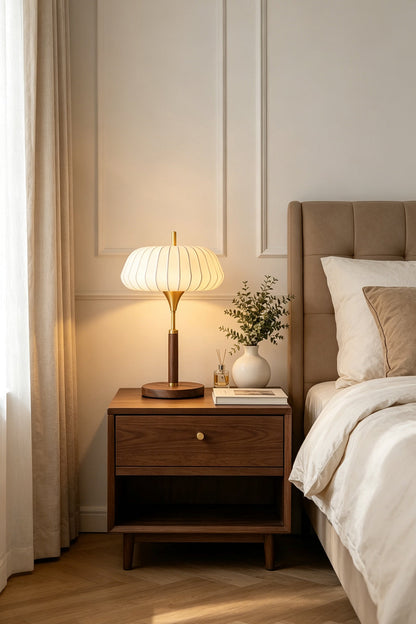 Maren Woven Silk Gourd Table Lamp | Woven Silk, Brass and Wood | Illuminating a bedside nightstand in a warm bedroom | vexa lamps