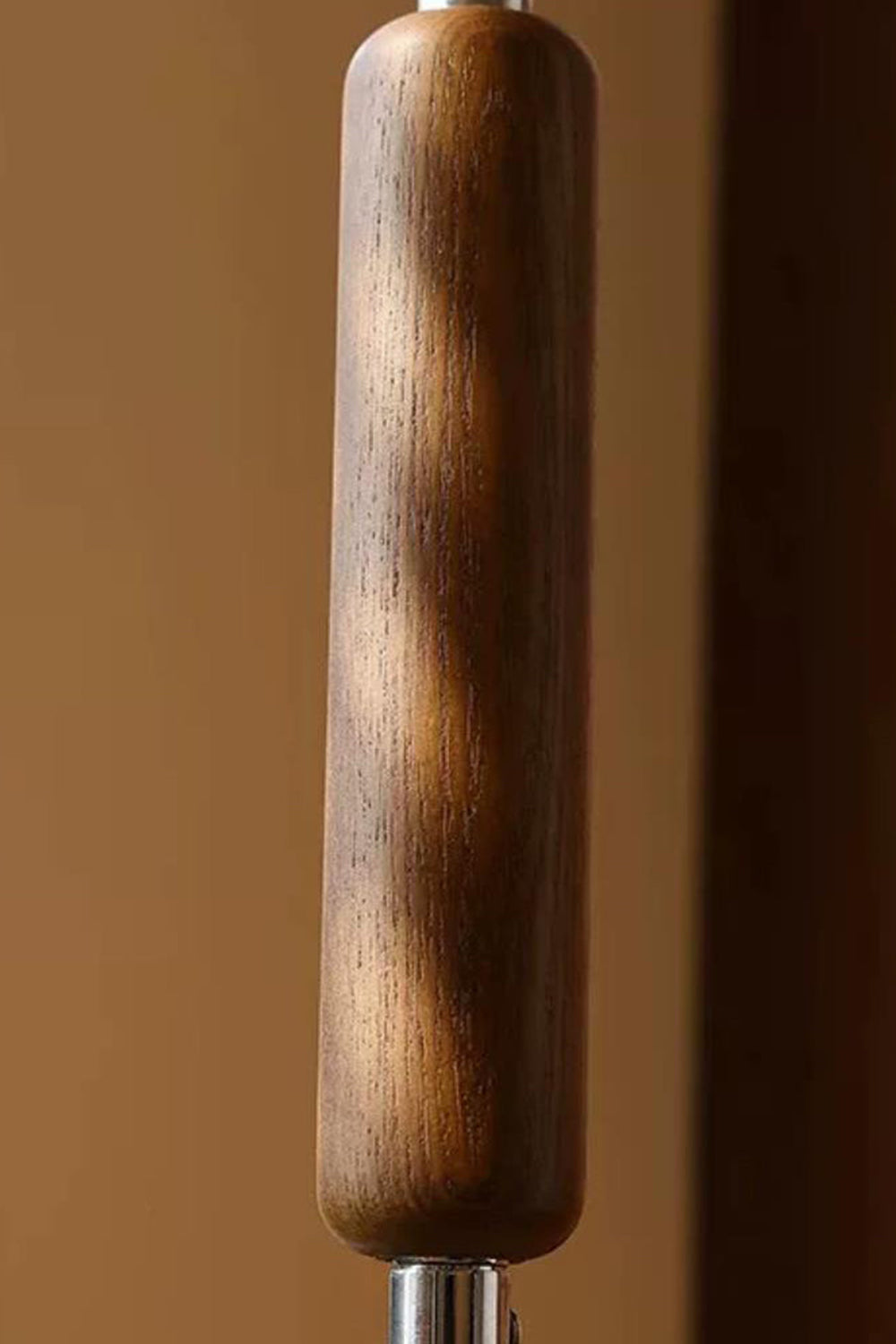 Marlowe Angled Linen Reading Floor Lamp | Linen, Wood, and Chrome Metal | Detailed close-up shot focusing on the rich texture of the fluted wooden accent grip on the metal rod | vexa lamps