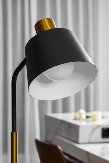 Marlowe Gooseneck Reading Floor Lamp | Matte Black and Brass | Close-up view of the black metal shade with white inner reflector and brass top | vexa lamps