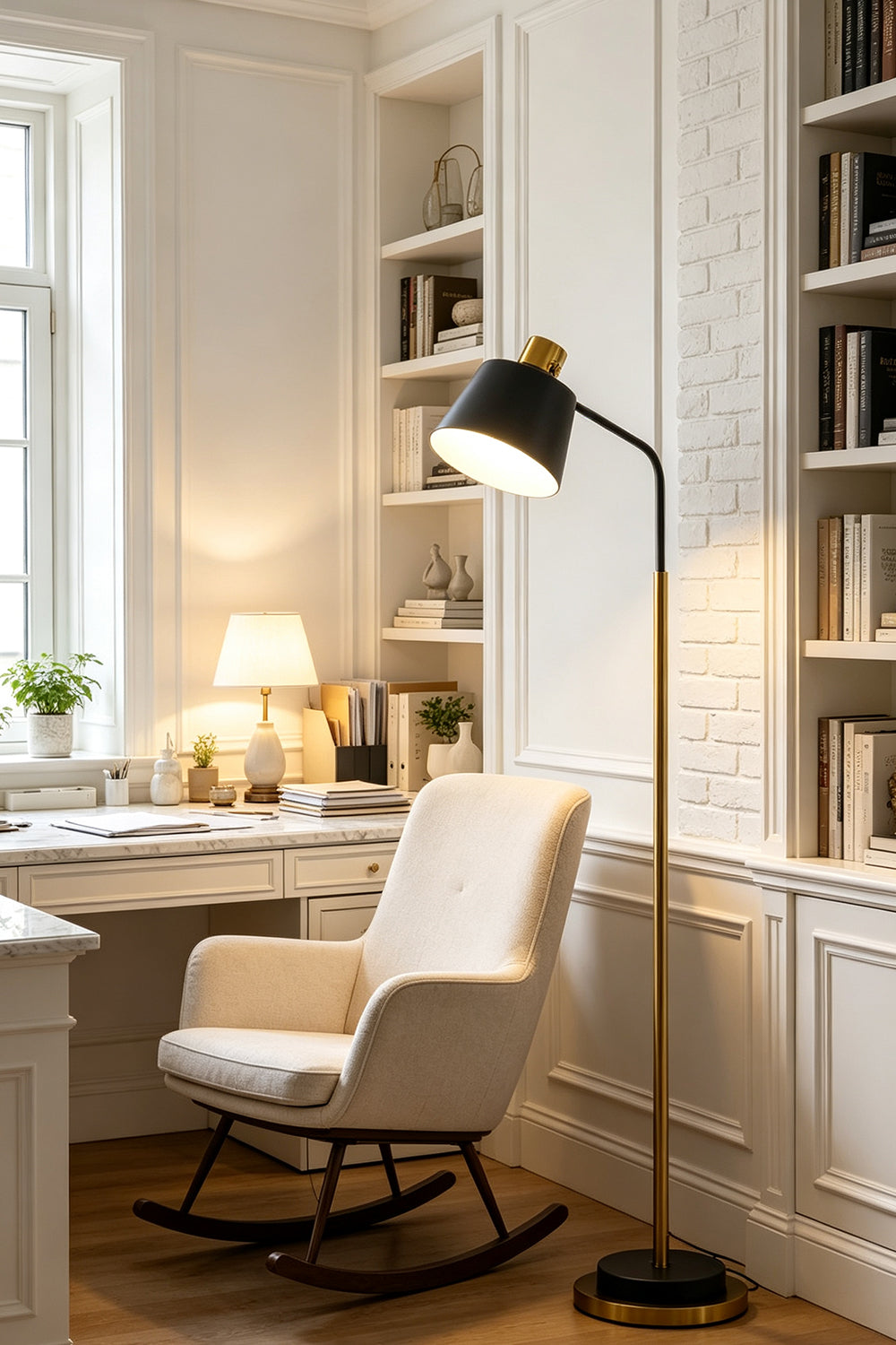 Marlowe Gooseneck Reading Floor Lamp | Matte Black and Brass | Styled beside a white rocking armchair and wooden desk in a modern home study | vexa lamps