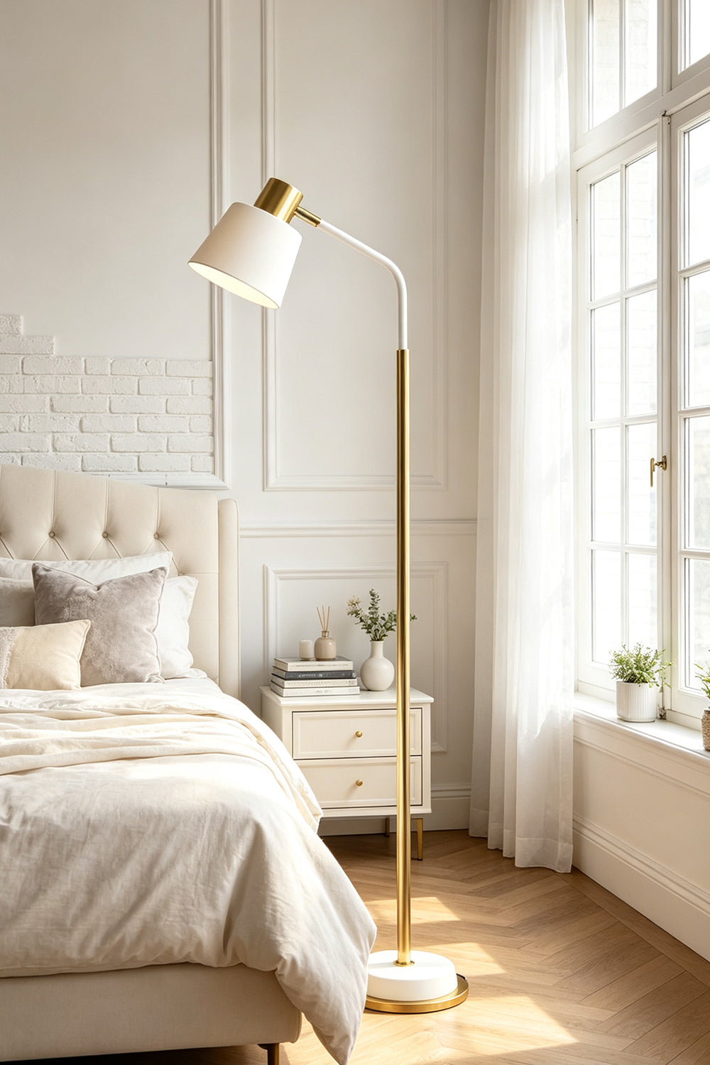 Marlowe Gooseneck Reading Floor Lamp | Matte White and Gold | Placed next to a bed with light linens in a sunny modern bedroom | vexa lamps