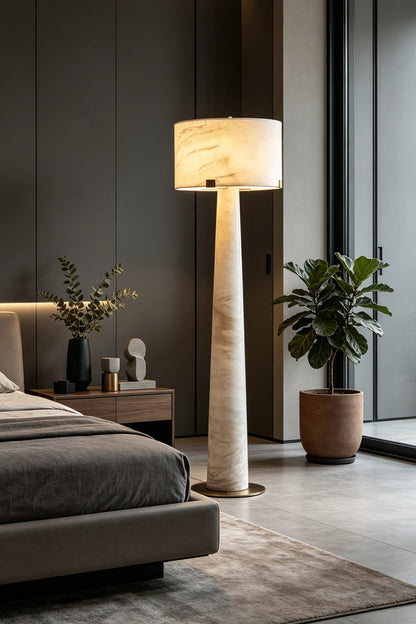 Meridian Column Alabaster Floor Lamp | Alabaster, Brass | Bedside installation in a master bedroom with grey tones | vexa lamps