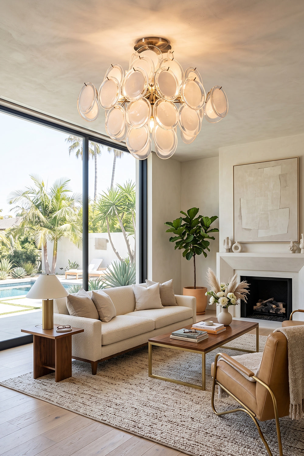 Mirella Circular Glass Pane Ceiling Light | Living Room Ambient Light | Radiating a warm cozy halo above a cream sofa and tan leather armchair in a spacious upscale living room | vexa lamps