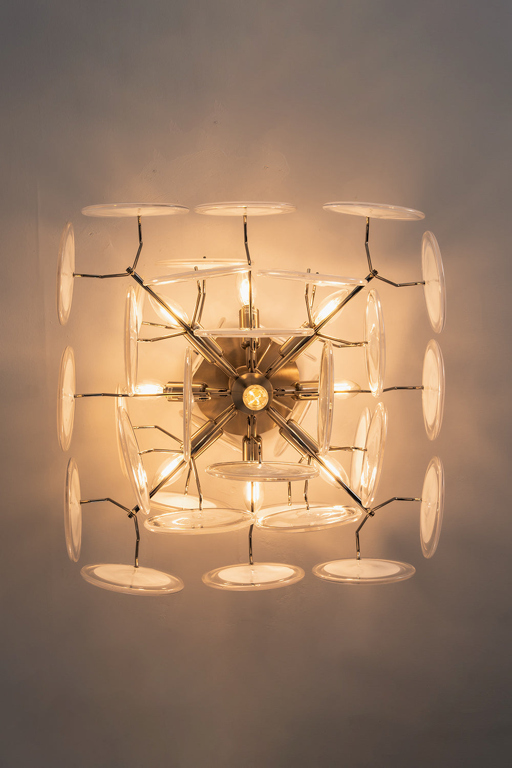 Mirella Circular Glass Pane Ceiling Light | Bottom-Up View | Direct bottom-up look at the fully illuminated ceiling lamp showcasing its radial symmetry and glowing multi-disc structure | vexa lamps