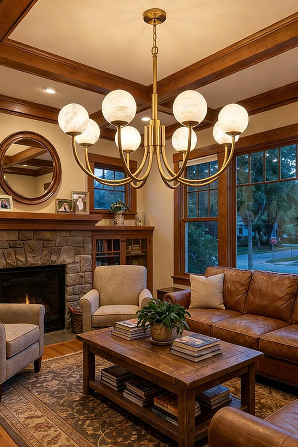 Brass chandelier with alabaster globes | Alabaster, Brass | Installed in a cozy living room with fireplace and leather sofas | vexa lamps