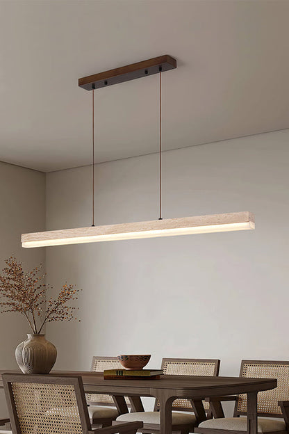 Travertine linear light providing warm downlight | Travertine, Wood, Acrylic | Perspective view in a modern dining setting | vexa lamps
