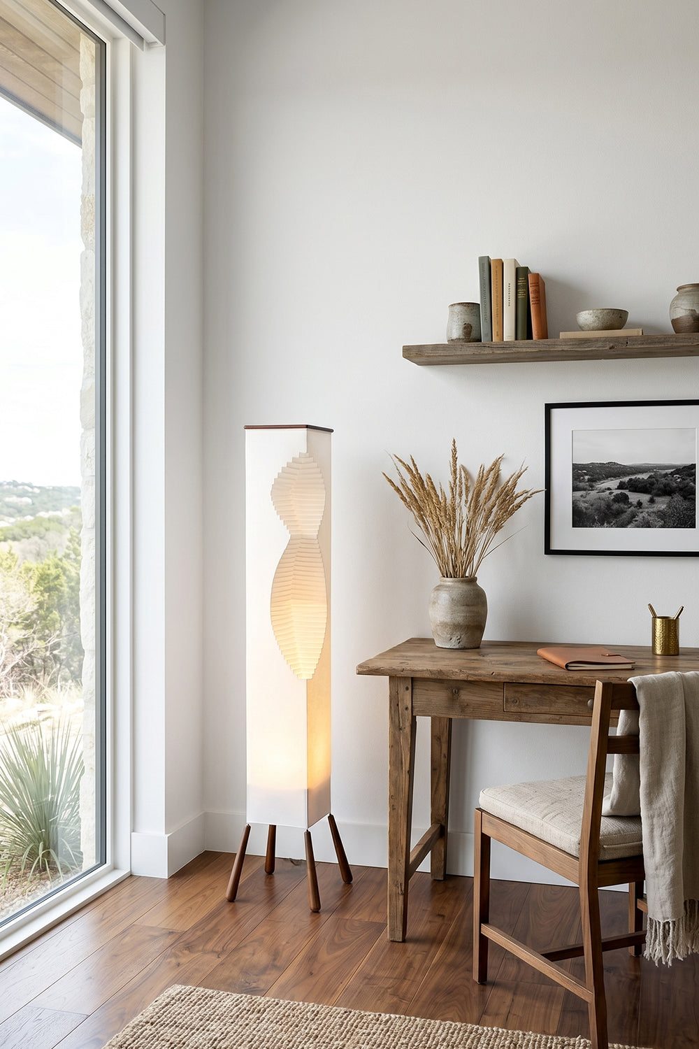 Nori Sculptural Leaf Floor Lamp | Fabric, Wood | Providing soft ambient light in a modern home office next to a wooden writing desk and chair | vexa lamps