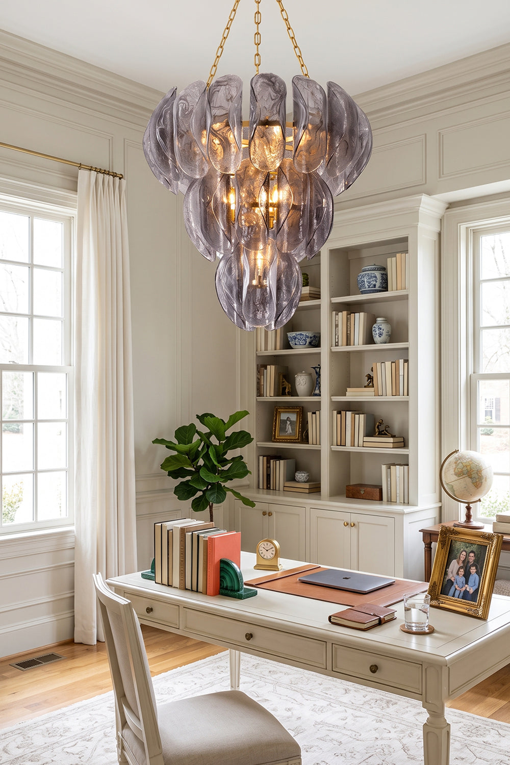 Ondine Cascading Leaf Glass Chandelier | Textured Smoked Glass and Gold Metal | Suspended in a bright home study area above a white desk with built-in open display bookshelves | vexa lamps