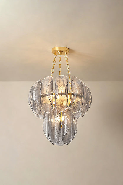Ondine Cascading Leaf Glass Chandelier | Textured Smoked Glass and Gold Metal | Standard perspective view showcasing the glowing multi-layered leaf arrangement against a warm neutral wall | vexa lamps