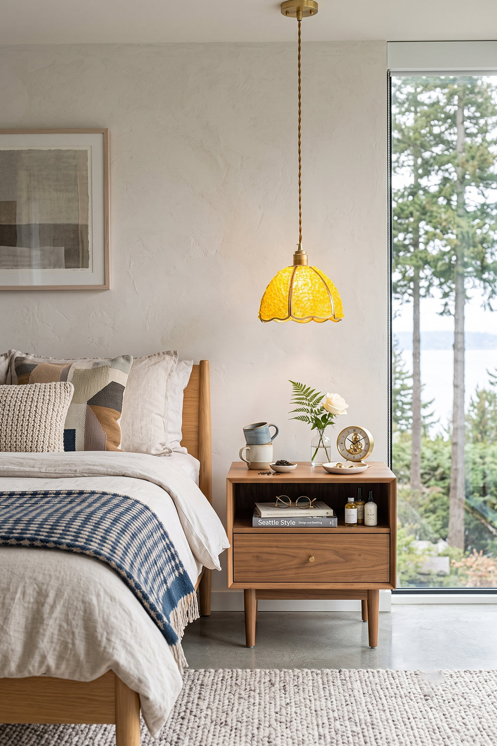 Mosaic-style Ondine Mosaic Glass Pendant Light illuminating a modern bedroom with wooden furniture and scenic views.