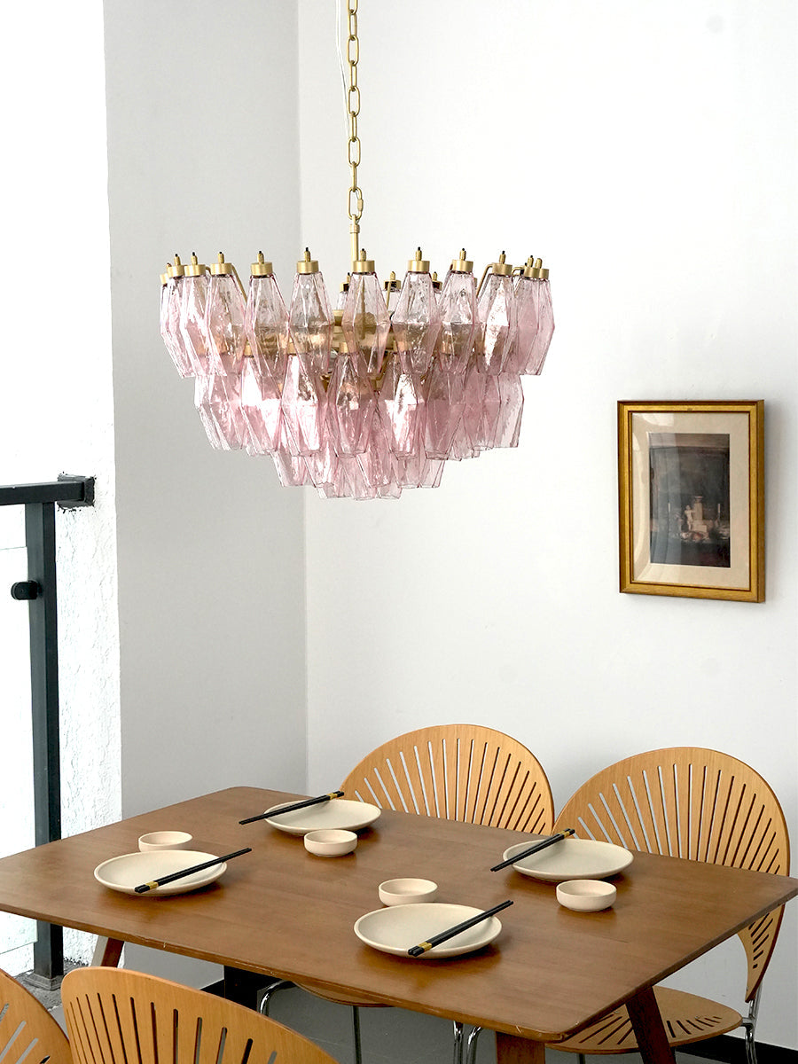 Tiered pink glass chandelier in a bright interior | Metal, Glass | Side view in a dining room with classical art | vexa lamps