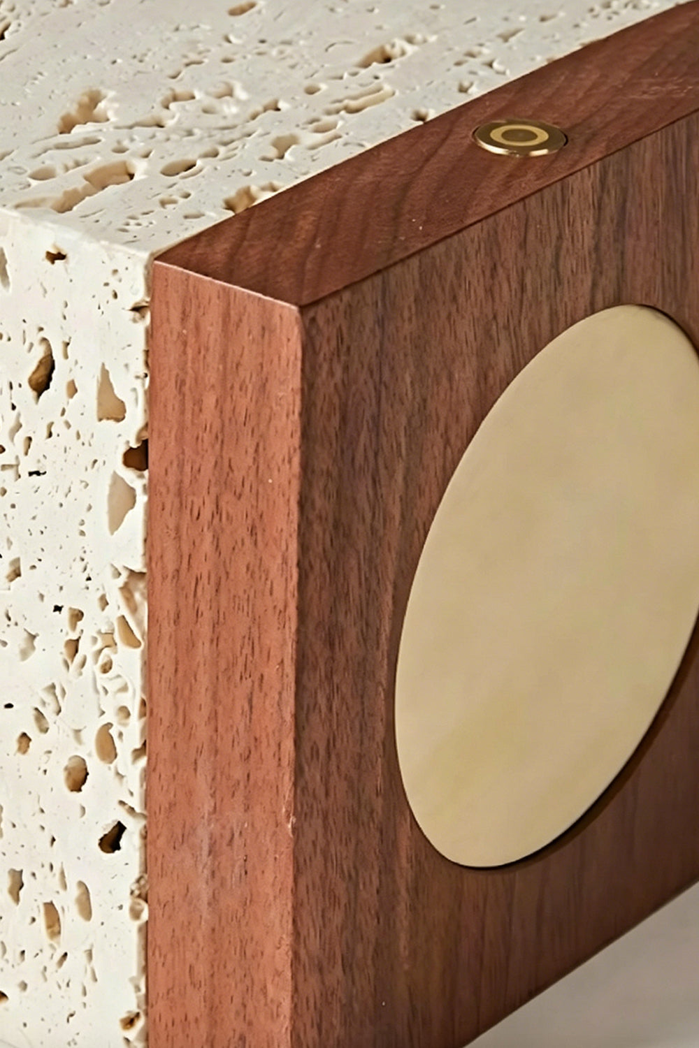 Radiant Monolith Travertine Table Lamp | Travertine, Wood | Extreme close-up side view | Gold switch and wood base detail | Travertine texture close-up | vexa lamps