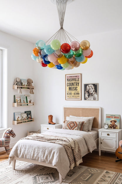 Rainbow Glass Bubble Cluster Chandelier | Glass, Metal | Installed as a whimsical and creative overhead light fixture in an aesthetic bedroom with a light wood platform bed | vexa lamps