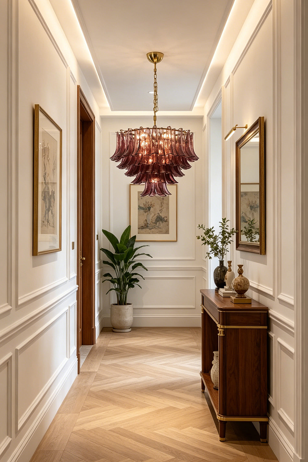Regal Purple Cascade Chandelier | Glass, Metal | Installed in a sophisticated hallway with a console table and framed art | vexa lamps