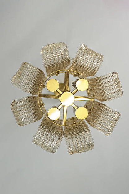 Ribbed glass scroll chandelier from below | Metal | Glass | Showing the flower-like symmetrical arrangement of glass panels | vexa lamps