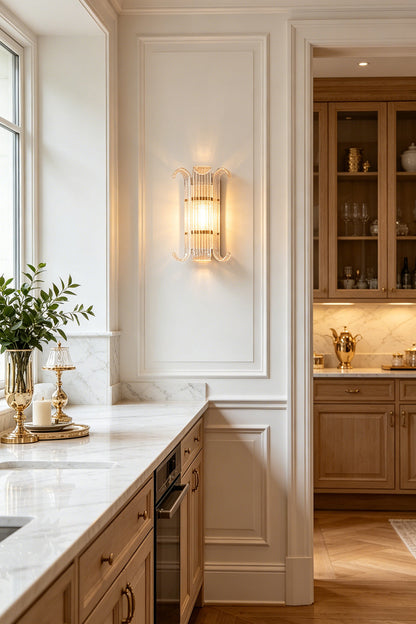 Ribbed Glass Scroll Wall Lamp in a bright kitchen space | Metal, Glass | Installed above white cabinetry and open shelving | vexa lamps