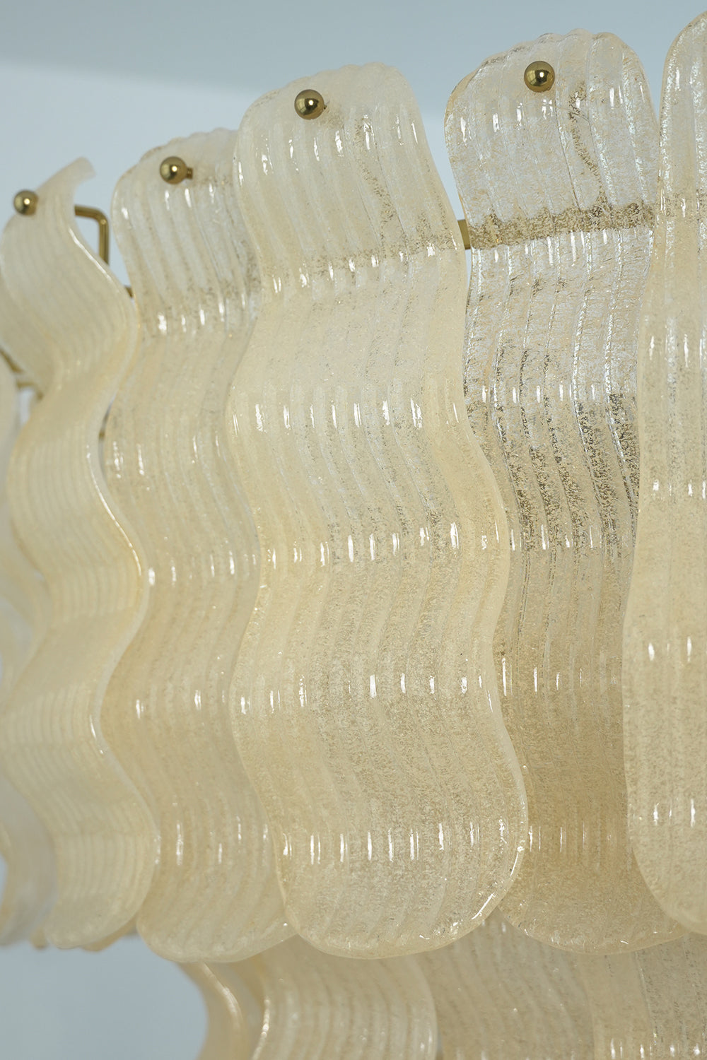 Ruffled glass panel texture detail | Glass | Close-up of the translucent ribbed glass finish | vexa lamps
