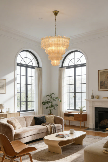 Large ruffled glass tiered chandelier | Metal | Glass | Centered in a traditional living room with arched windows | vexa lamps