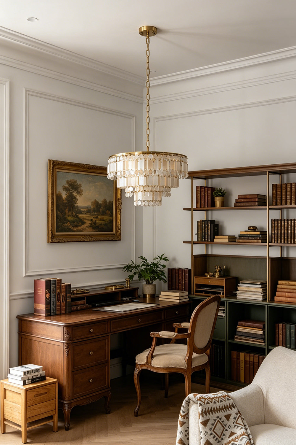 Seraphina Capiz Cascade Metal Chandelier illuminating a sophisticated home office with vintage decor.