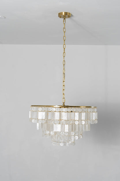 Seraphina Capiz Cascade Metal Chandelier hanging from the ceiling with elegant capiz shell discs.
