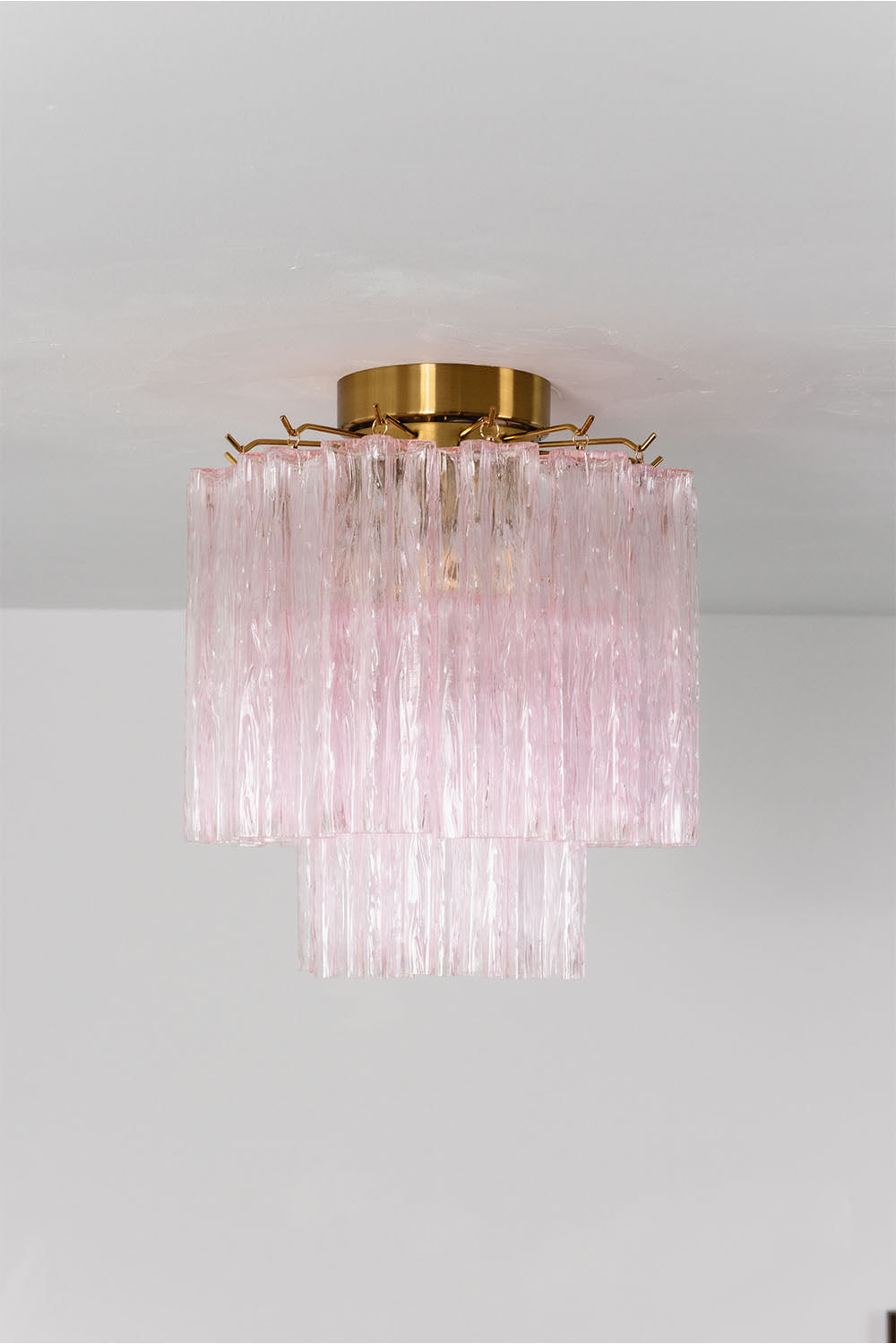 Seraphine Starburst Glass Tube Ceiling Light | Pink Glass and Brass | Front illuminated view mounted against a plain white backdrop | vexa lamps