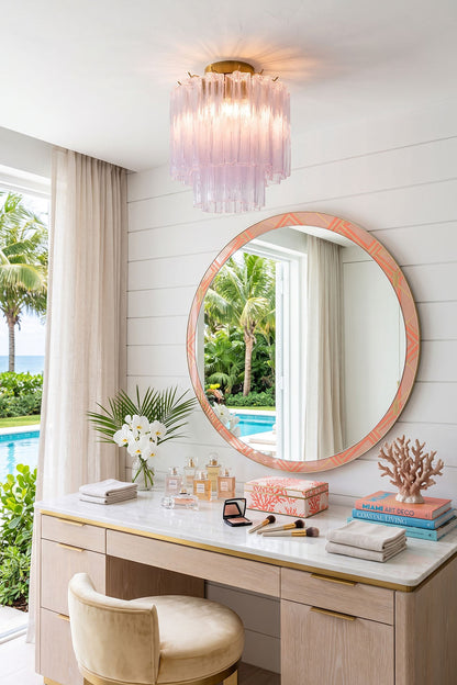 Seraphine Starburst Glass Tube Ceiling Light | Pink Glass and Brass | Displayed above an elegant vanity dressing table with a round mirror | vexa lamps