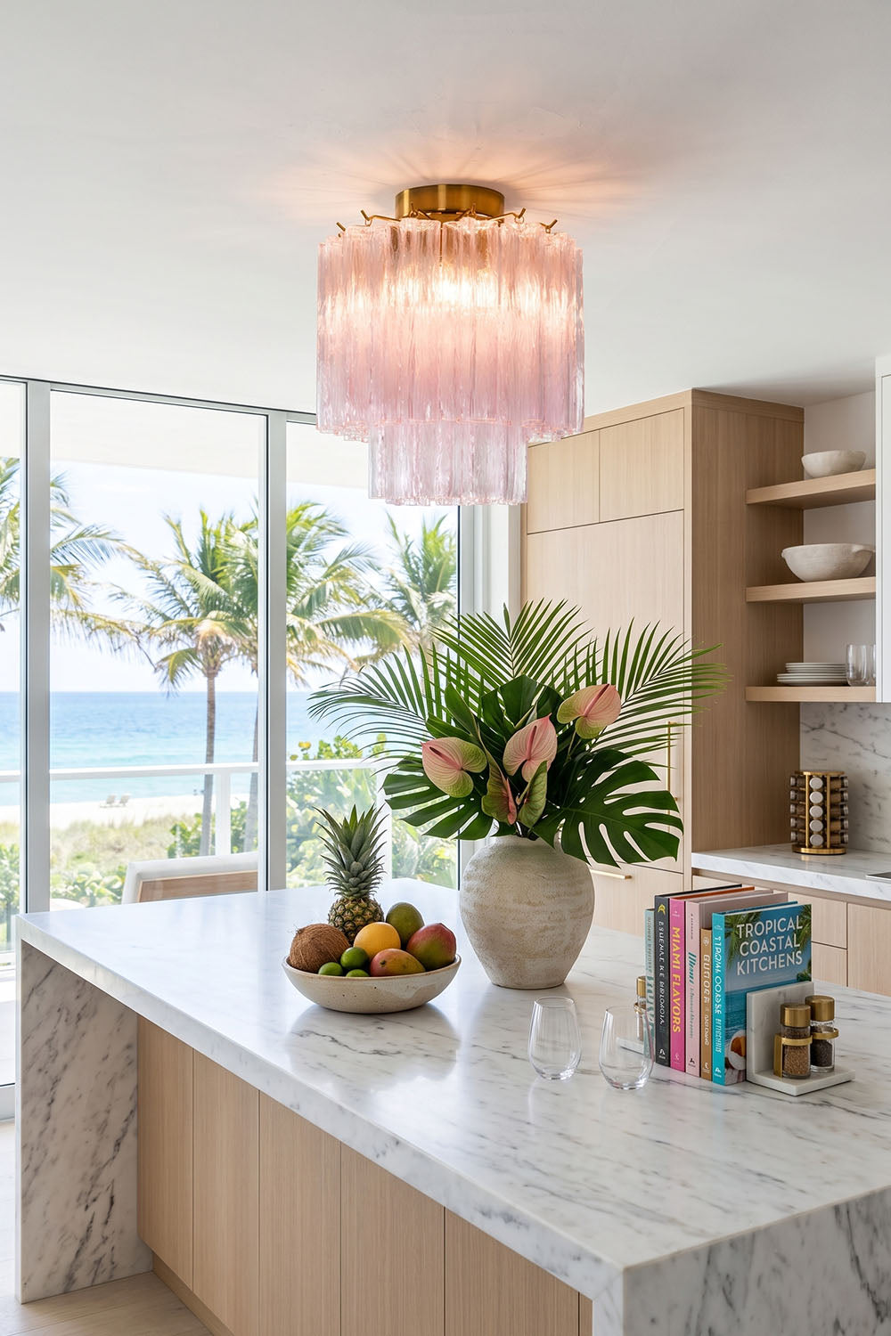 Seraphine Starburst Glass Tube Ceiling Light | Pink Glass and Brass | Centered above a marble kitchen island in a sunlit room | vexa lamps