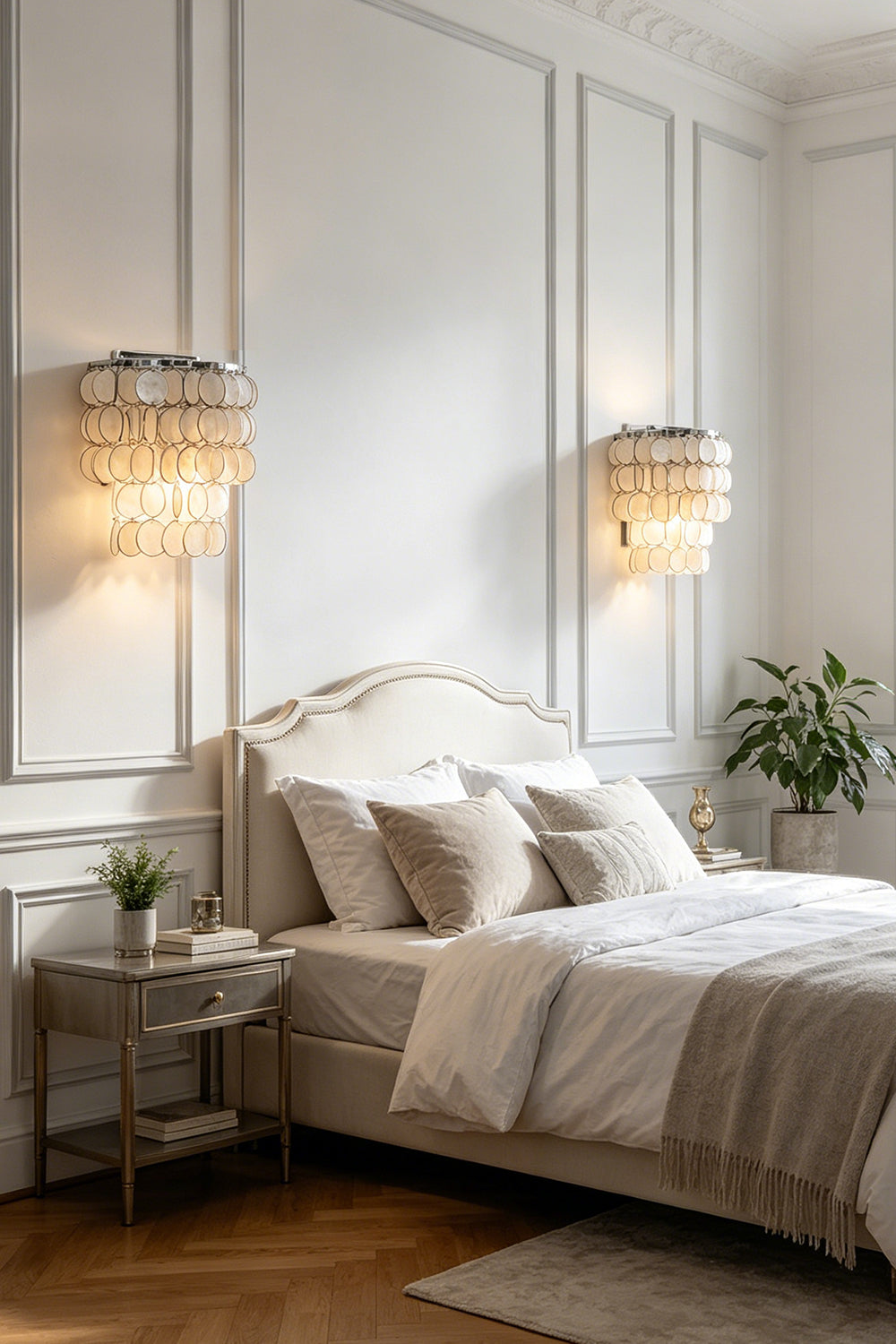 Pair of shimmering Capiz wall lamps | Shell | Iron | Installed on both sides of a bed in a classic bedroom | vexa lamps