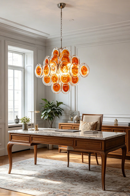 Mid-century modern amber glass chandelier | Metal, Glass | Installed in a spacious home office over a wooden desk | vexa lamps