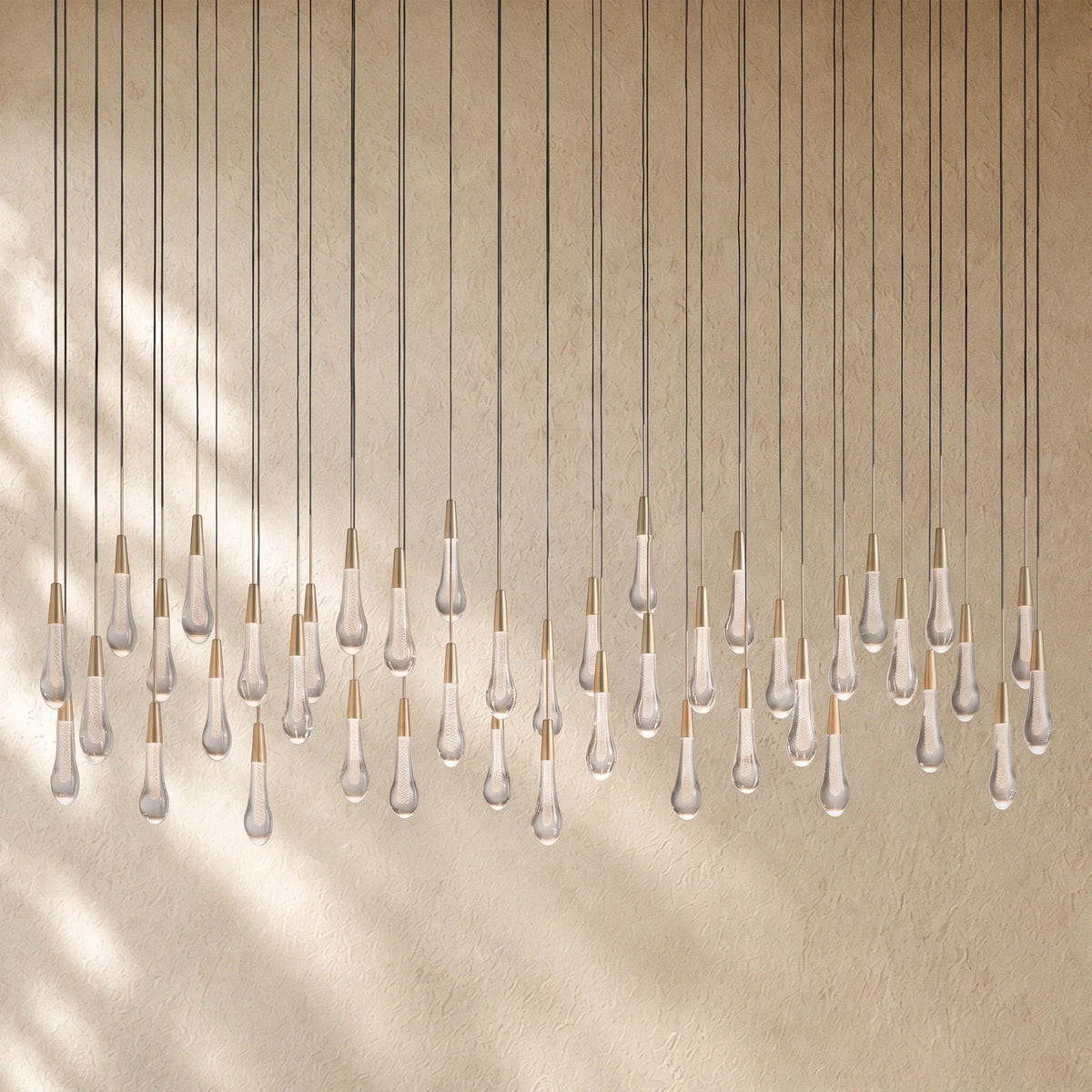 Soltairan Linear Chandelier - Raindrop Pendant Lighting - 70” 42-Light / Brass