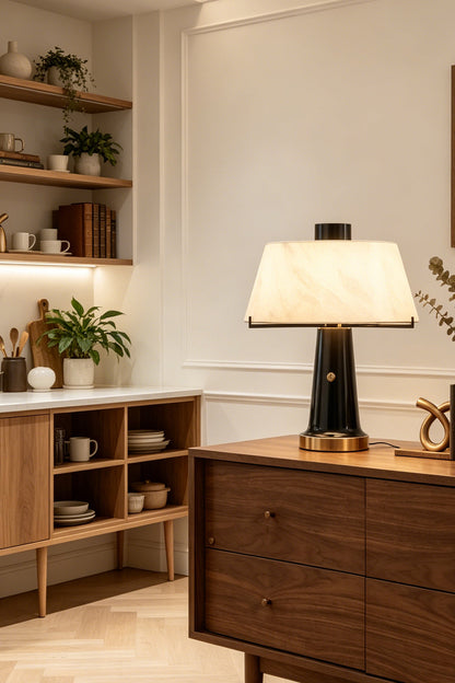Sovereign Alabaster Radiance Wall Lamp illuminating a cozy kitchen space with wood accents.