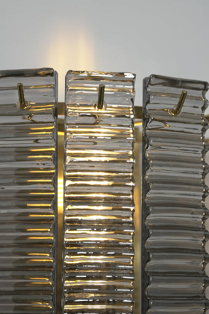 Sovereign Lattice Smoky Glass Wall Lamp with ribbed smoky gray glass and ambient internal illumination.