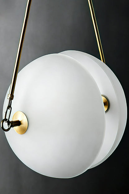 Low-angle close-up of split glass hemispheres | Glass, Metal | Showing the matte white finish and central rod | vexa lamps