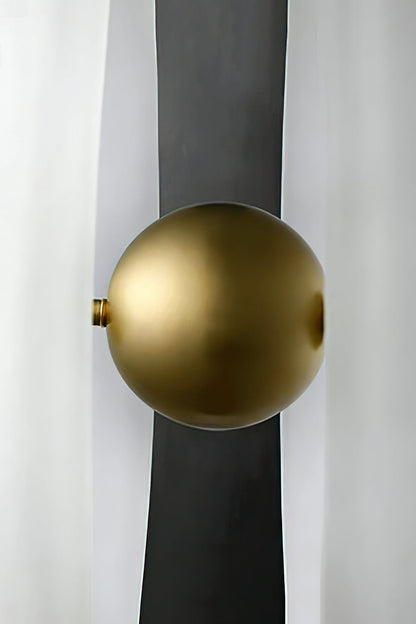 Macro view of the central brass ball and split glass | Metal, Glass | Showing the polished hardware and shadow gap | vexa lamps