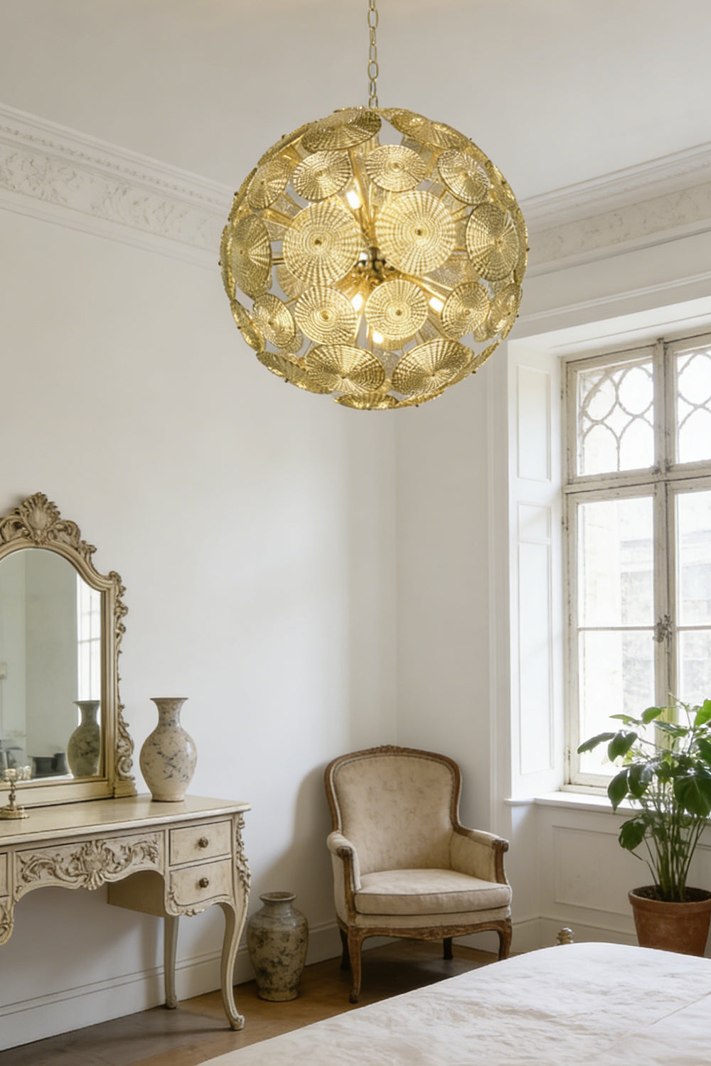 Lit spherical glass disc chandelier | Metal, Glass | Installed in a sunlit living room corner | vexalamps
