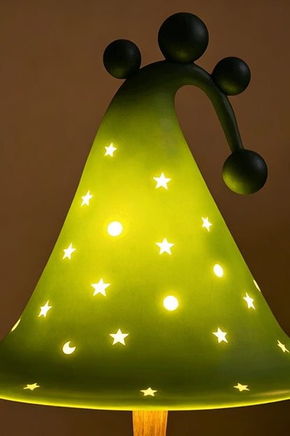 Sylvan Astral Resin Table Lamp |  star pattern shade | Lit close-up | Detail of glowing stars | Resin material texture | vexa lamps