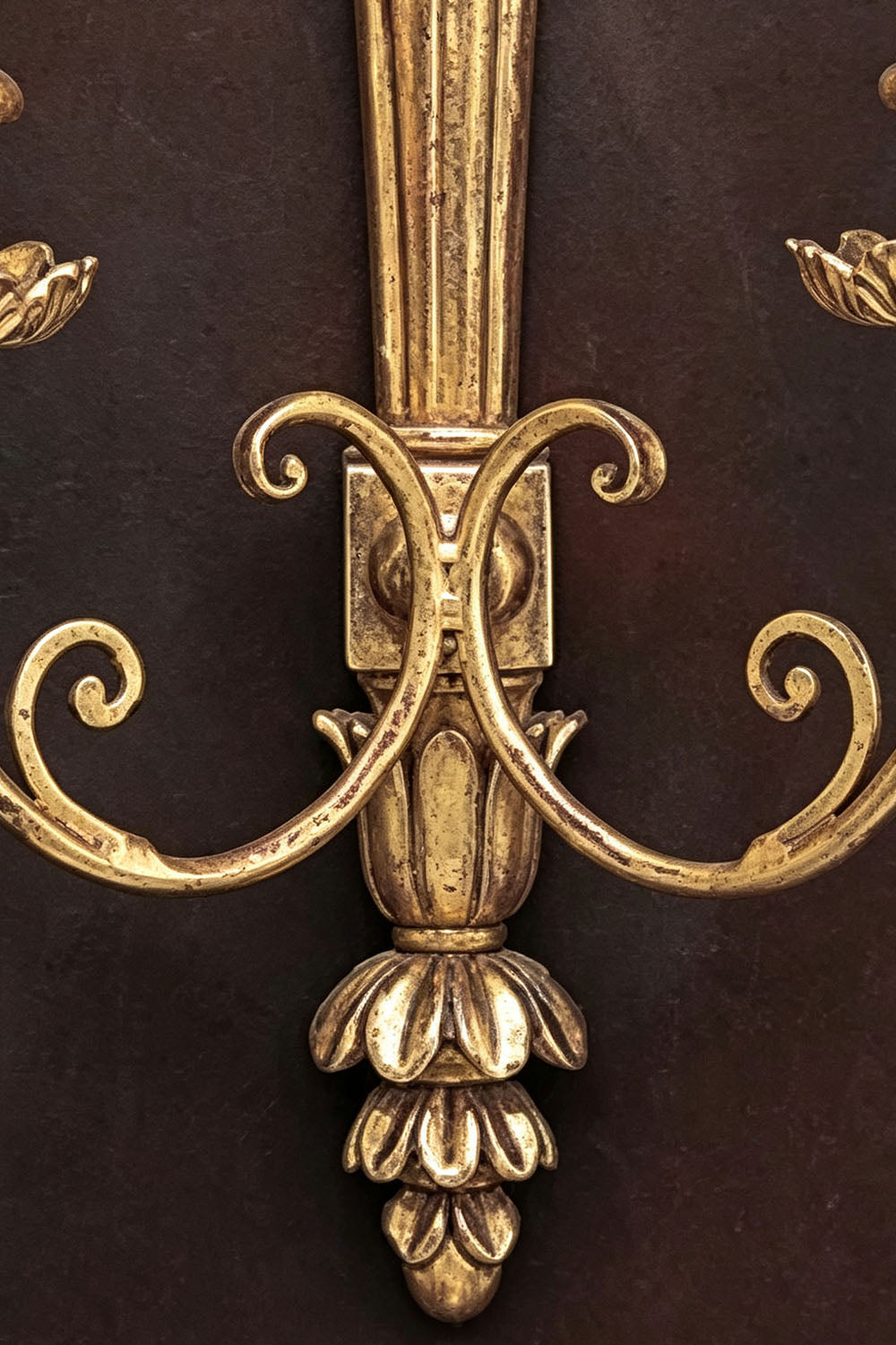 Tamsin Carved Plume Candle Wall Lamp | Carved Resin and Brass | Macro detail showing the lower scrollwork and acorn finial bottom | vexa lamps
