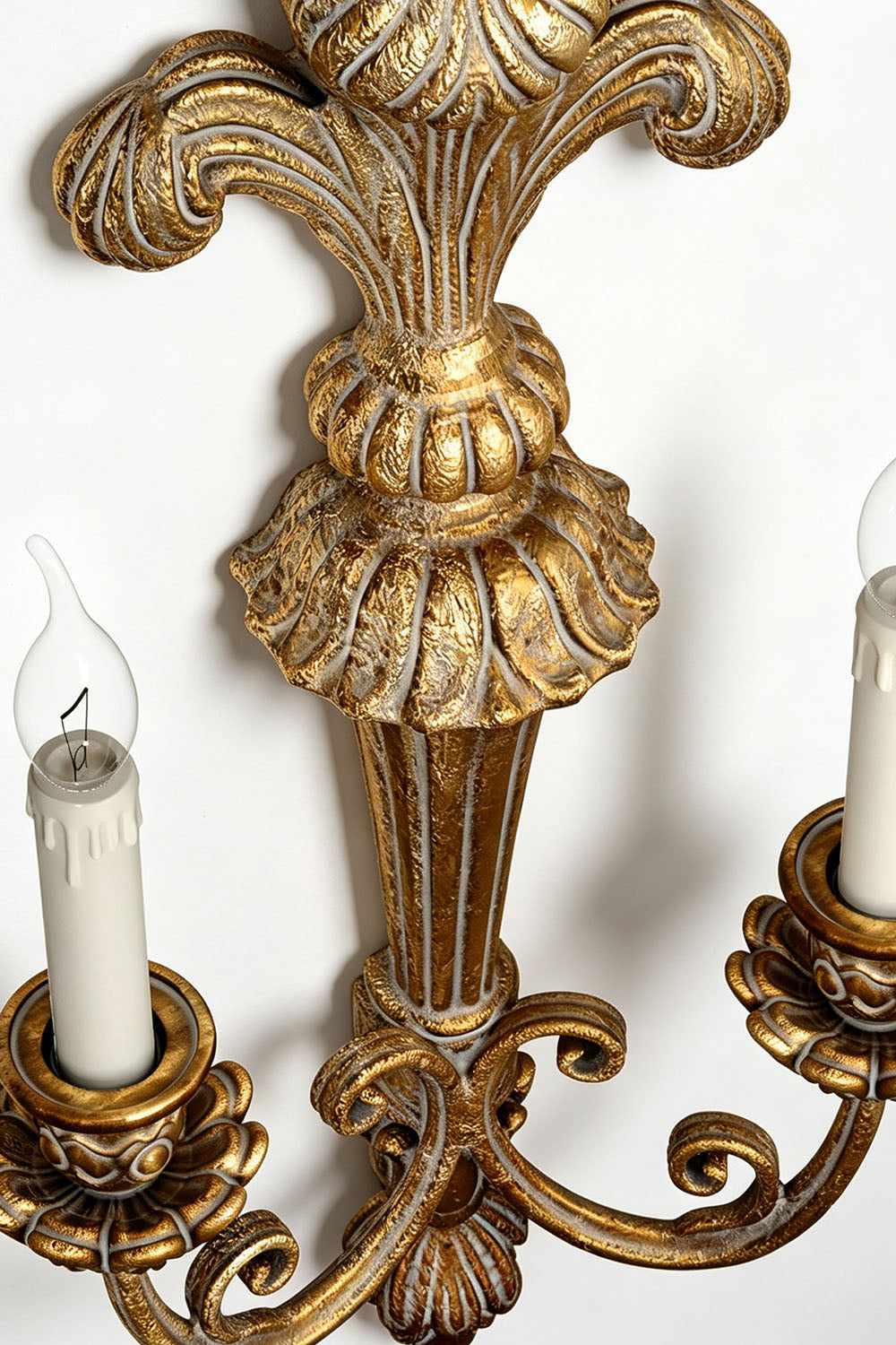 Tamsin Carved Plume Candle Wall Lamp | Carved Resin and Brass | Detail shot highlighting the antique gold leaf finish and carved textures | vexa lamps