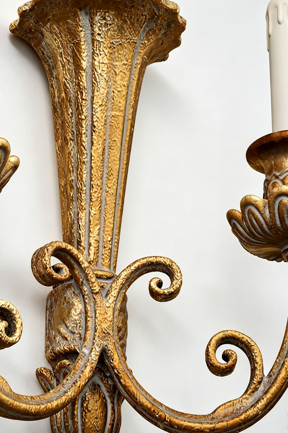 Tamsin Carved Plume Candle Wall Lamp | Carved Resin and Brass | Close-up detail of the main carved column and twin curved sconce arms | vexa lamps