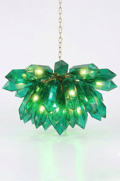 Lit teal prism cluster chandelier showing green glow | Metal | Glass | Front view with internal lights on white background | vexa lamps