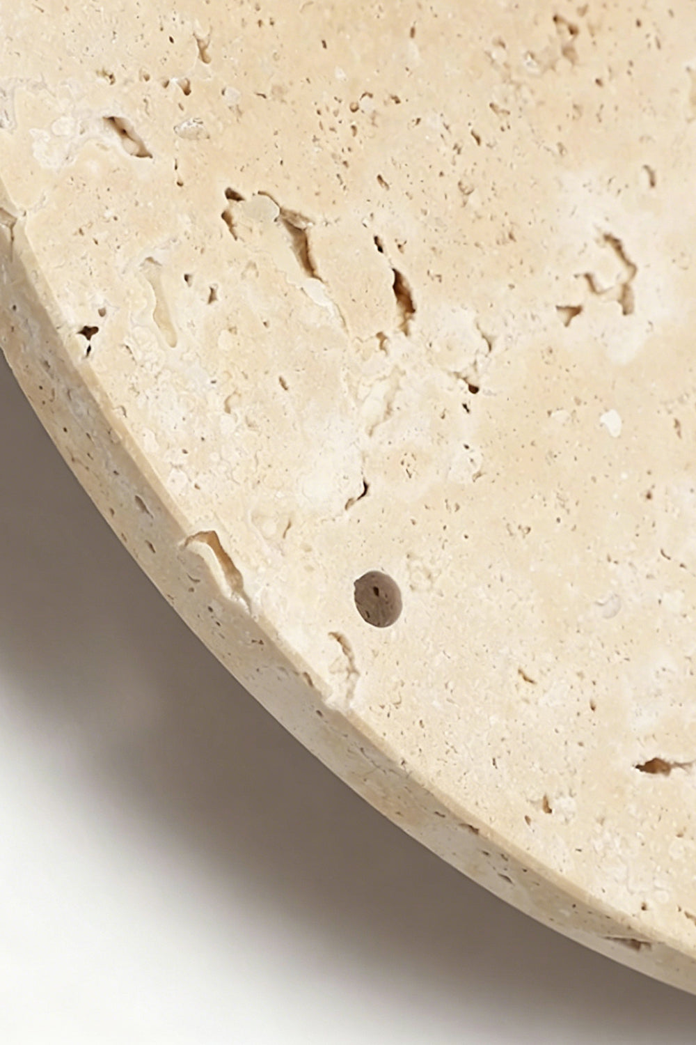 Temporal Epoch Material Detail | Travertine | Macro shot of the porous natural stone edge and texture | vexa lamps