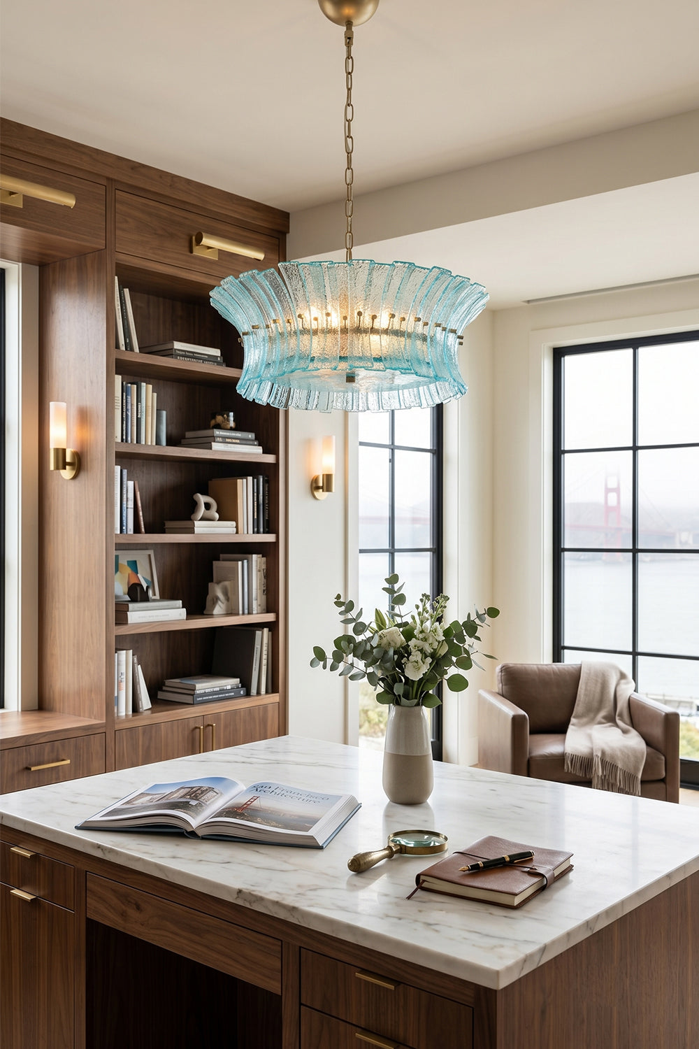 Thalassa Aquamarine Textured Glass Chandelier | Glass, Metal | Positioned as a luxury accent light fixture in a sophisticated home executive workspace featuring a large desk and built-in library shelves | vexa lamps