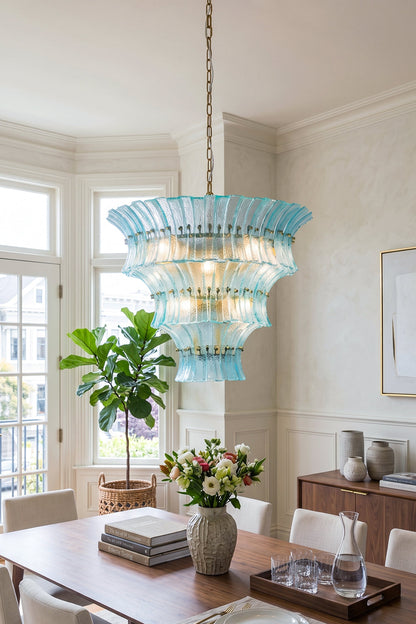 Thalassa Aquamarine Textured Glass Chandelier | Glass, Metal | Staged over a minimalist wooden table set with fresh flowers in a sunlit open-plan contemporary dining area | vexa lamps