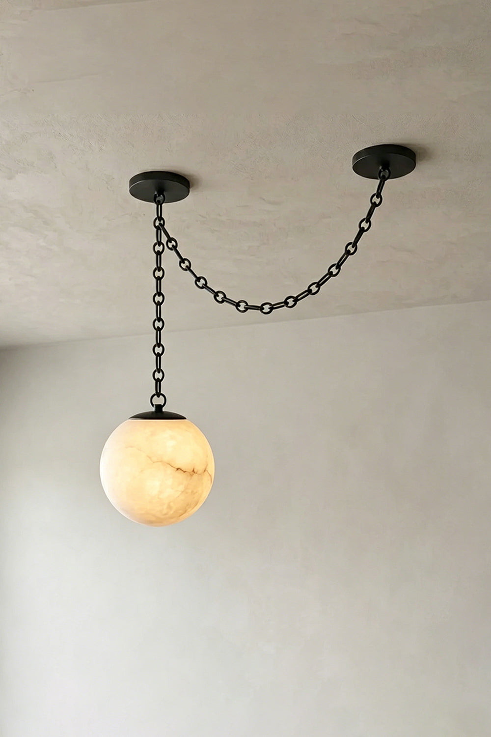 Thalia Alabaster Spherical Chain Chandelier with hand-carved alabaster spheres and brushed links.