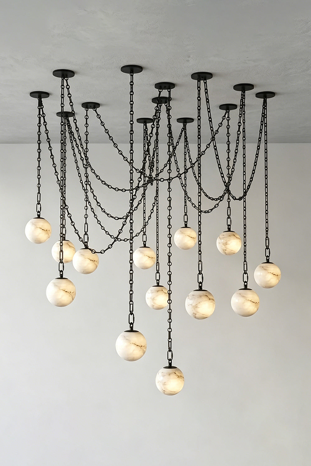 Thalia Alabaster Spherical Chain Chandelier with hand-carved alabaster spheres and brushed links.