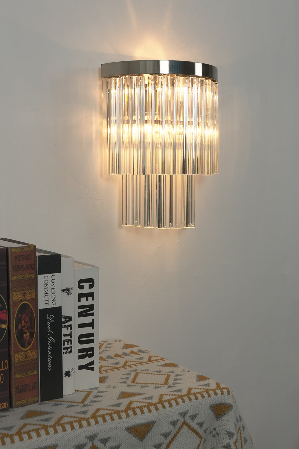 Lit tiered column glass wall light | Metal, Glass | Angled lit product shot | vexalamps